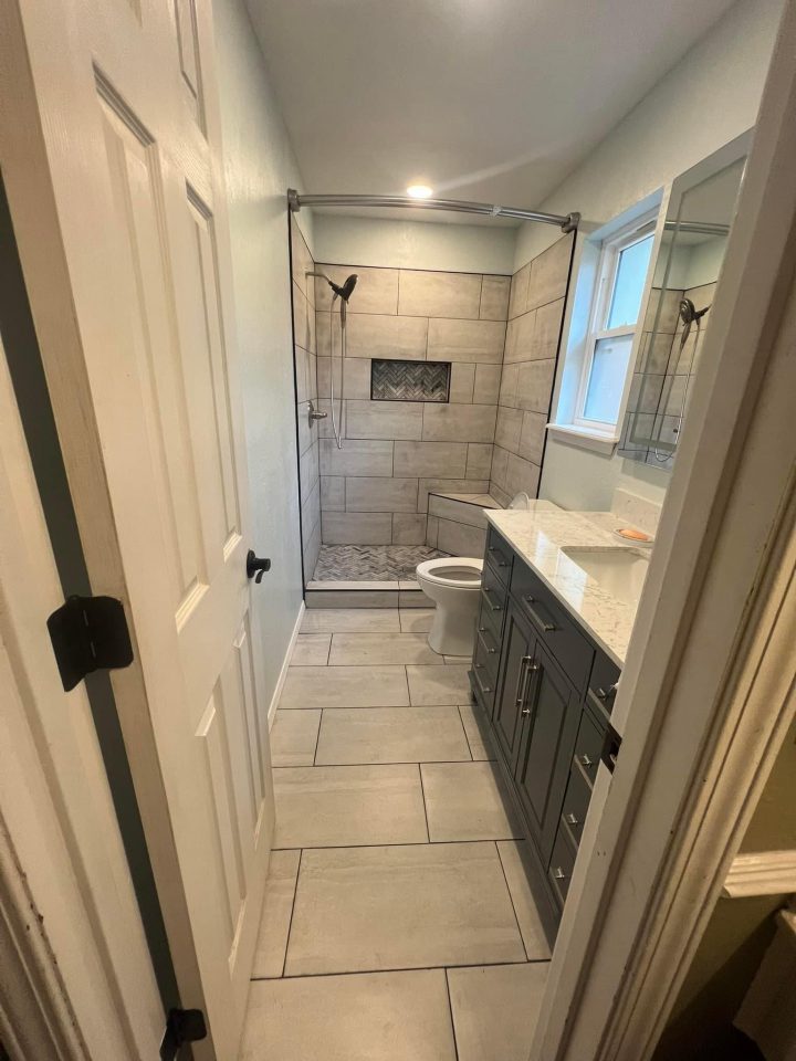 Walk-in shower bathroom remodel with modern vanity